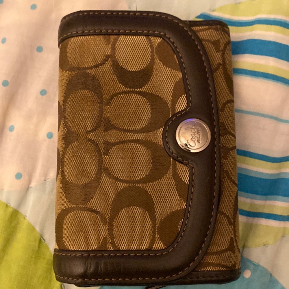 Authentic coach compact wallet.